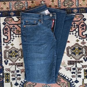 Vintage late 90s/early 2000s low rise, flare Lucky Brand jeans.